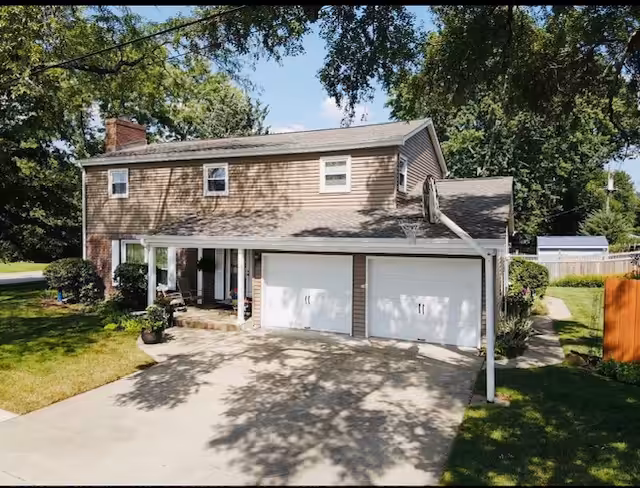 Two-story house with garage and driveway